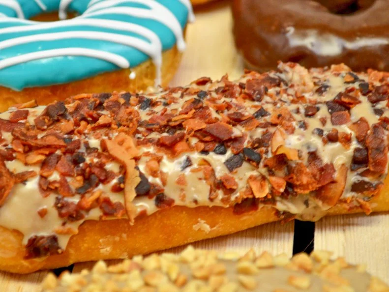 Topeka has gone a bit doughnut-crazy. Case in point: Until recently, there were three doughnut shops in a one-block radius. Baker’s Dozen, though, has consistently risen above the competition since 2005. This multi-locale operation cranks out almost 1,800 doughnuts a week to keep up with demand at its three shops, along with the nine local Kwik Shop convenience stores that stock its sweet rounds. Fan-favorites include the Blueberry Cake Donut and the Caramel Bacon Long John, but the most-popular option by far is the massive Caramel Nut Roll. 