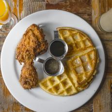 Thereâ  s no such thing as a slow day at Tanya Hollandâ  s perpetually packed Brown Sugar Kitchen. Locals and visitors line up daily to try the acclaimed chefâ  s inventive soul food, which includes a yeasty, cornmeal waffle inspired by California cooking icon Marion Cunningham. The dishâ  s other components â   juicy herbed buttermilk fried chicken and a sticky apple cider syrup â   are dedicated to the two other important culinary figures in Hollandâ  s life: her mom and grandmother.
