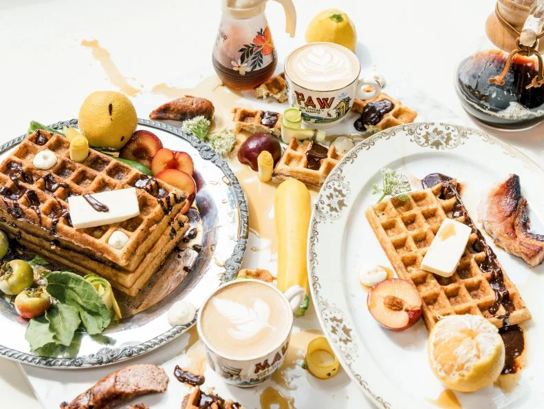 There is no such thing as a boring meal at Milktooth, the wildly imaginative restaurant from Chef Jonathan Brooks. Housed inside a former auto repair garage, the modern-day diner has become known for imaginative twists on brunch fare, including Belgian waffles that change with the seasons (and the imaginative whims of pastry pro Zoe Taylor). Come summer, you may find shredded Indiana zucchini mixed into the sourdough batter; winter months could yield persimmon butter and candied pecans. Even the coffee is no average cup of Joe — pair your next-level waffle with an equally unique drink like the Blvck Bear, a shot of espresso mixed with tart cherry syrup and steamed milk.