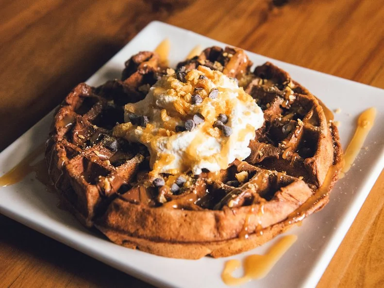 Waffle Saturday is the brainchild of “waffle master” Adam Schonert and co-owner Erika Jensen, a chocolatier who trained at the famed L.A. Burdick before opening The Chocolate Season in her hometown. The seasonally rotating menu is as decadent as it gets, with combinations like the Baconator (a smoky bacon waffle strewn with whipped butter, salted candied pecans and maple syrup) and the Salted Chocolate (a cocoa-infused waffle with Nutella, whipped cream, caramel sauce and salted caramelized cornflakes). They’re only available during morning hours, which means you have full permission to eat dessert for breakfast.