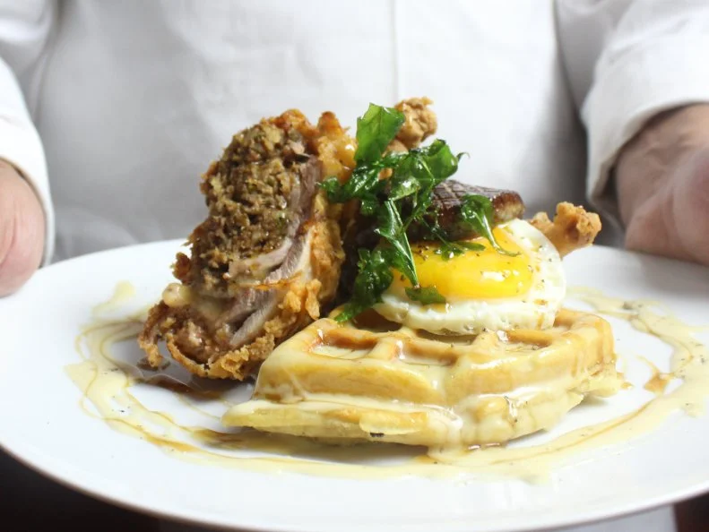 If there’s pressure in being one of the youngest of the Commander’s Palace family, SoBou isn’t showing it. The lively French Quarter saloon — located south of Bourbon Street (get it?) — has matches its siblings’ reputations, serving small-ish plates with Cajun and Creole influences. Chicken and waffles get a luxurious makeover in the form of crispy quail, a fried egg, Crystal hot sauce hollandaise and a standout waffle made with pepper jack cheese and cornmeal. The $32 brunch comes with an appetizer and dessert, so plan to arrive hungry.