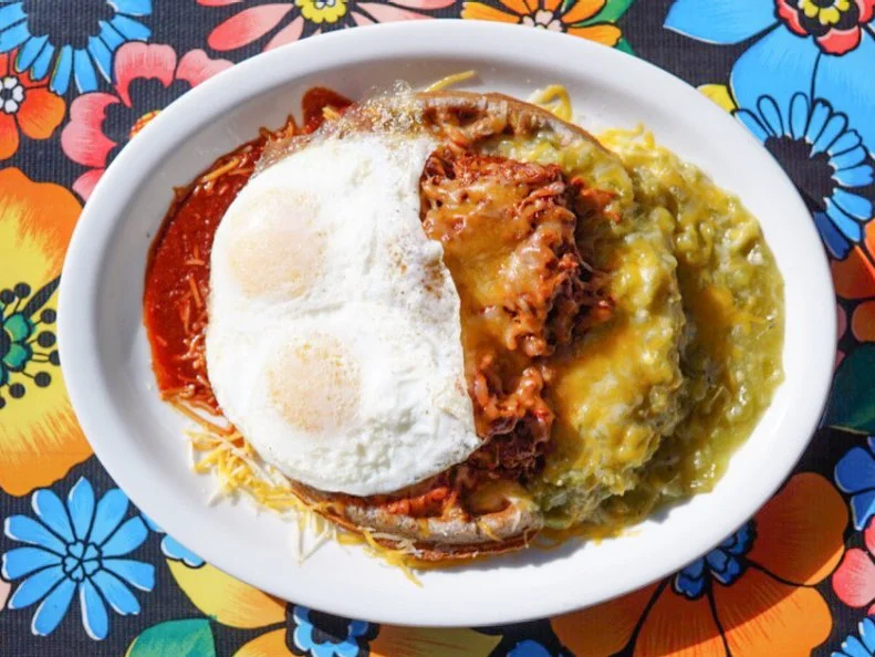 The Waffles Rancheros at this Albuquerque outlet capture so much of what New Mexico has to offer. The hearty meal starts with a quintessential New Mexican crop, blue corn, which goes into the waffle. The indigo-hued round is blanketed in slow-roasted carne adovada, cheddar cheese and fried eggs, then smothered in two sauces, one made from spicy red chiles and the other from green Hatch peppers.