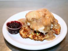 <p>Owner Adam Gold is still serving up waffles and blasting tunes just like he did at his college parties. Guy savored the "sweet and crispy" fried chicken and waffles with hot sauce syrup and devoured the stuffing waffle with smoked turkey, cranberry sauce and mashed potatoes.</p>