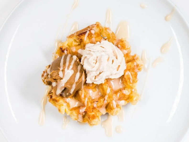Rhode Island’s capital city is in the midst of a baked-good renaissance, thanks to top-tier businesses like Rebelle Artisan Bagels, PVDonuts and the matter-of-factly named Waffle, where the liege style reigns supreme. The brioche-like circles come plain, but those looking to expand their palates should order one of Waffle’s signature creations. There’s the year-round breakfast waffle, which caps the liege rounds with a fried egg, cheddar and local maple syrup, or seasonally changing specials inspired by classic desserts.