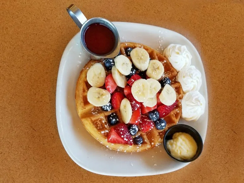 Itâ  s not just the food that conjures childhood jot for the South Dakotans who visit Phillips Avenue Diner â   itâ  s the whole old-school set-up. Outfitted with retro soda fountain fixtures, the eatery specializes in greasy-spoon classics like omelets, pancakes and crispy made-to-order waffles. Two are available daily: the Belgian with powdered sugar and maple syrup and the Sunrise, piled high with fresh fruit, strawberry syrup and whipped cream. Aficionados should come on Waffle Wednesdays for creative specials.