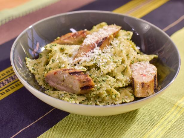 Spinach, Walnut and Golden Raisin Pesto Pasta with Italian Chicken Sausage image