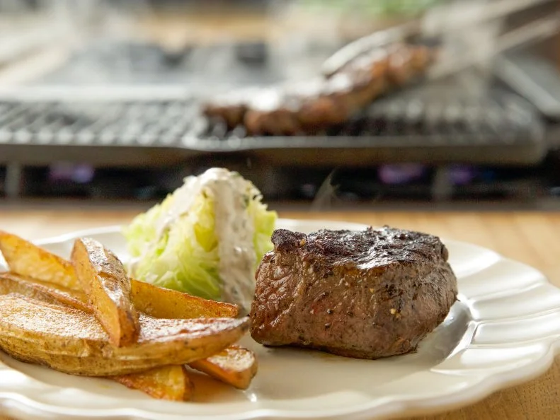 Close-up of Steak Frites with Lemon and Pepper Seasoning and Easy Hollandaise