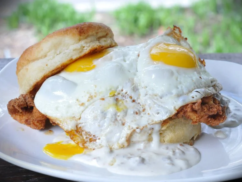 Known for its comorting Southern favorites like chicken and waffles, eggs any style and biscuits loaded with housemade jelly, this all-day diner is obligatory eating when visiting The A. Unsurprisingly to Southerners, the jumbo biscuits star prominently in many of Folk Art’s best breakfast sandwiches. Take, for instance, the Folk Southern Fried: It’s fried chicken, a fried egg and sausage gravy piled onto one of those big old griddled biscuits. Not up to the task of taking down a fried chicken sandwich first thing in the morning? Go with the slightly tamer turkey sausage, egg and cheese on a biscuit, asiago bagel or English muffin. http://www.folkartrestaurant.com