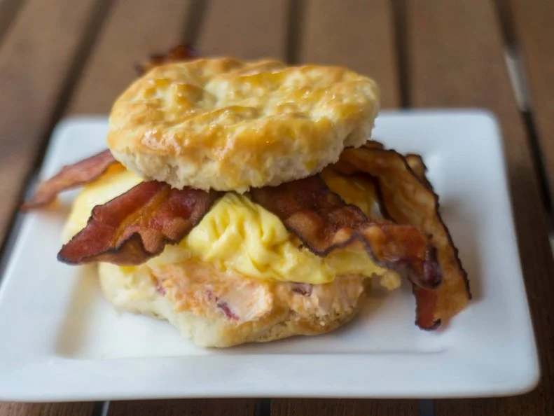 This downtown Montgomery restaurant only opened in 2017, but it's already gotten a reputation for superlative Southern fare, including a biscuit bar at breakfast. Custom creations start with Cahawbaâ  s fluffy $1 biscuits. From there, diners can pile on all sorts of fillings, like scrambled eggs, fried green tomato, sausage gravy, pimento cheese, and meat options such as sausage, bacon or a boneless fried chicken breast. Make it a real feast and pair your sandwich with a side of the cinnamon apple fries. http://www.cahawbahouse.com