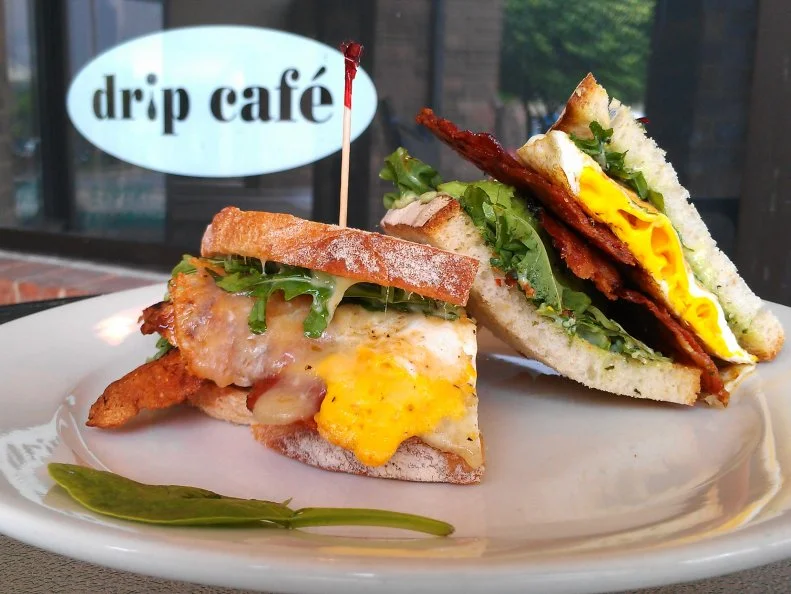 By working with local farmers who favor sustainable agricultural practices, Drip Cafe is on a mission to foster a stronger link between the community and the sprawling farmland surrounding Hockessin. Customers can feel good knowing the ingredients on their breakfast sandwich are hyper-fresh and responsibly sourced. The Cali, a nod to organic-obsessed West Coasters, features a fried egg, mozzarella, avocado, arugula and basil aioli on sourdough toast. Craving something meatier? You need the Brunch Burger, an eight-ounce beef patty served on grilled sourdough along with smoked bacon, fried onions, sliced tomato, green chiles, smoked gouda and an over-medium egg.http://dripcafede.com/menus/breakfast/