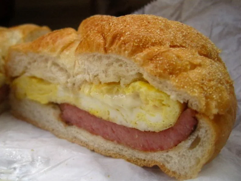 Johnâ  s Roast Pork has long been a favorite of South Philadelphians, but ever since the James Beard Foundation named it an American Classic in 2006, this low-key sandwich shop has gained widespread acclaim as making one of the best cheesesteaks in the City of Brotherly Love. The best part? You donâ  t need to wait until lunch hours to try it. Johnâ  s all-day breakfast sandwich menu offers the coveted cheesesteak and eggs on one of Phillyâ  s signature long Italian hoagie rolls. The scrapple, eggs and American cheese with a side of cherry peppers is yet another delicious way to soak up last nightâ  s booze. (We would be remiss not to mention that the Roast Pork Sandwich, though not a breakfast item, is widely regarded as the best in the country.)http://www.johnsroastpork.com