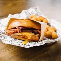 During its first six months of operation, this cafÃ© with a conscience donated more than 30,000 sandwiches to local people in need. Today, that number exceeds 1 million. Serial entrepreneur and Even Stevens founder Steve Down wanted to inject the local food scene with his pay-it-forward ethos. So, for every item sold at Even Stevens, a sandwich is donated to a local hungry person. Although it was hard to find investors willing to commit to the risky business model at first, the ever-growing throng of eager fans quickly convinced doubters. But enough about conscious capitalism. Weâ  re here to talk about breakfast, and the Even Stevensâ   breakfast sandwich is the best in the area. This maple-glazed sammy comes with two eggs, cheddar and a choice of bacon, ham, sausage, pork belly or avocado on a sweet Hawaiian bun. (Get the pork belly.) https://evenstevens.com/menu/