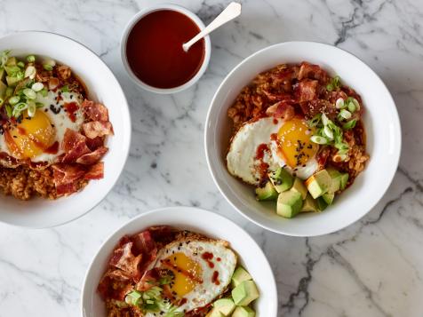Gochujang Brown Rice Bowls Topped with Avocado, Bacon, Scallions, and Fried Eggs