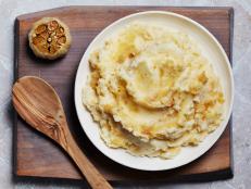 Roasted garlic and mashed rutabaga bump up the flavor of classic mashed potatoes.