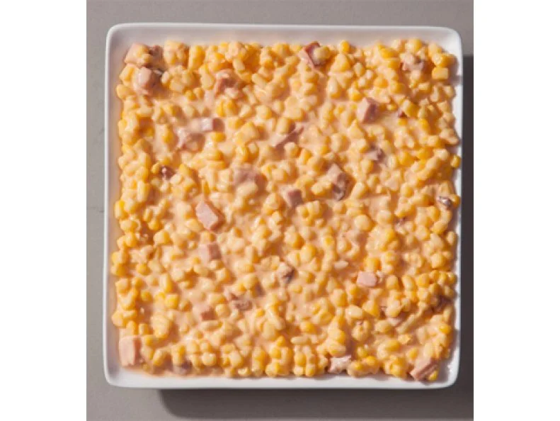 Kansas City is lauded for its regional style of slow-smoked meats and tomato-based sauces, but no 'cue experience is complete without sampling the supporting cast of sides. In Kansas City, one dish with a devoted local following is the cheesy corn bake at Fiorella's Jack Stack Barbecue. Founder Jack Fiorella's wife created this creamy, crowd-pleasing concoction in their home kitchen. Delores makes her dish by combining corn kernels with sharp aged cheddar cheese, cream cheese, milk, garlic and diced hickory-smoked ham burnt ends, then baking the mixture in a covered dish until it's hot and gooey. Locals can order as much as a gallon from the takeout menu. Follow their lead and pair the dish with the Hickory Pit Beans, combining both sides into one smoky, cheesy spoonful.