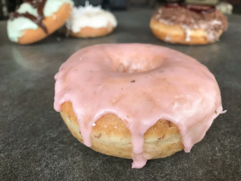 Before opening their Boise shop, married couple Angel and Kevin Moran sold doughnuts at farmersâ   markets; today, they still glean inspiration from market stalls, using locally grown fruit for creations like the raised vegan blood orange-basil doughnut. Tart, freshly squeezed blood orange juice gets a sprinkle of cardamom and a punch of local basil for the sweet housemade glaze.