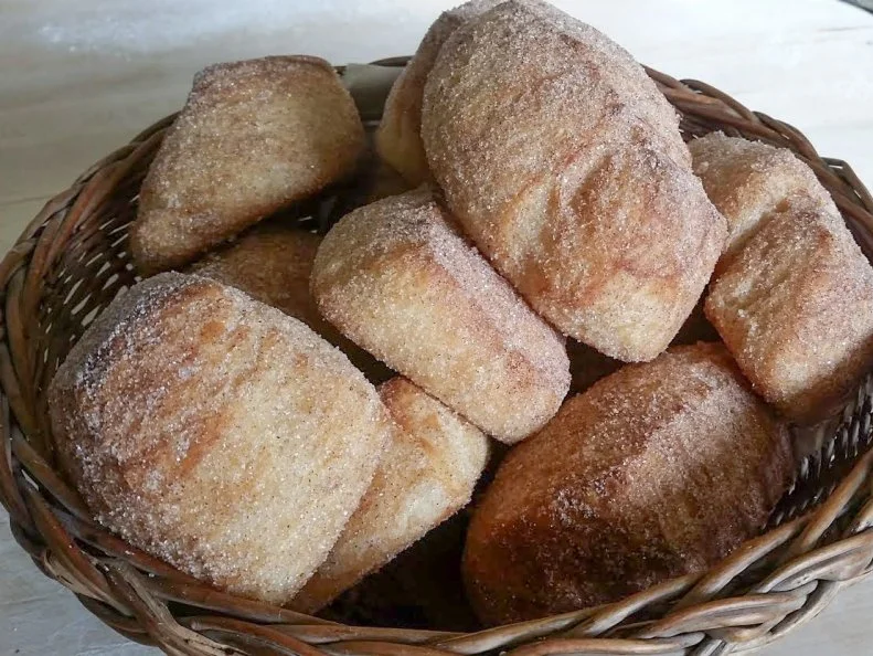 When Red Hen Baking Co. was looking for a way to use the scraps of dough trimmed off during the croissant-making process, the staff discovered that rolling out, cutting an dbaking squares to toss in cinnamon sugar made for a treat that tasted remarkably like doughnuts. Owner Randall George says they make a great little inexpensive treat, but suggests you snatch â  em up when you can, as they are in limited supply depending on how many batches of croissants they are making.