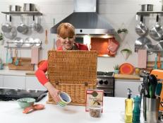 Contestant Lisa Starrett with her Mystery Basket, as seen on Chopped U, Season 1.