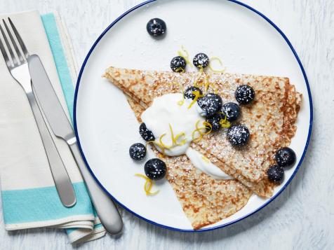 Thin Lemon Pancakes with Sweetened Sour Cream and Blueberries