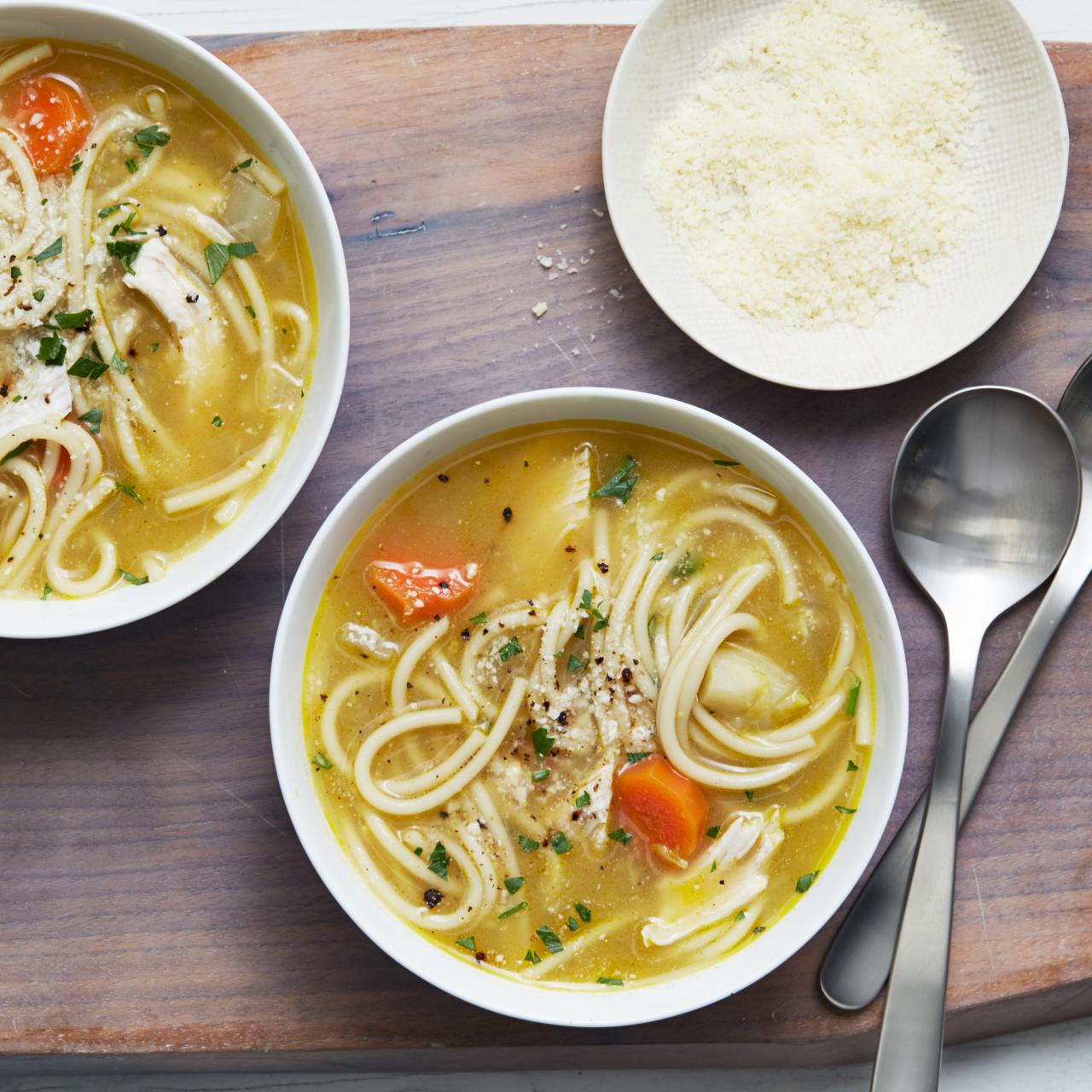 https://food.fnr.sndimg.com/content/dam/images/food/fullset/2018/4/1/2/LS-Library_Parmesan-Chicken-Noodle-Soup_s4x3.jpg.rend.hgtvcom.1280.1280.suffix/1522652656723.jpeg