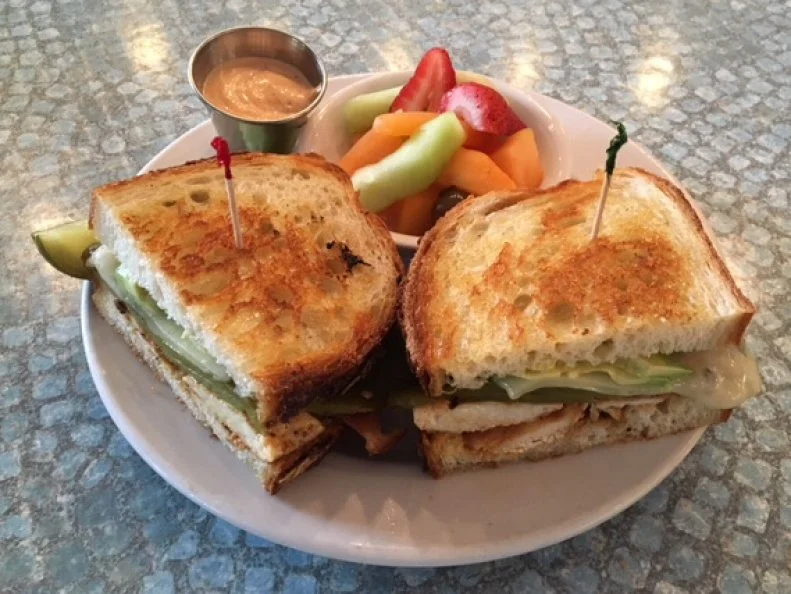 This warm and inviting neighborhood deli is the place to go for breakfast and lunch standards in Scottsdale. Locals chat together and fill up on omelets, hot dogs, cold sandwiches and traditional Jewish fare like knishes and pastrami sandwiches. But this is the Southwest, so JJ’s Deli’s menu caters to chili-obsessed Arizonans. Its Santa Fe Grilled Chicken Sandwich is one to actually get excited about. Combining juicy grilled chicken, Swiss cheese, avocado and a piquant portion of green chili stacked between two slices of grilled sourdough bread coated with a bit more heat in the form of homemade chipotle mayonnaise, this sandwich is something locals crave — and not just because they’re trying to cut calories.