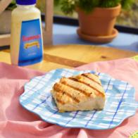 Katie Lee grills salmon with mayonnaise to the fish from sticking, as seen on The Kitchen, Season 17.