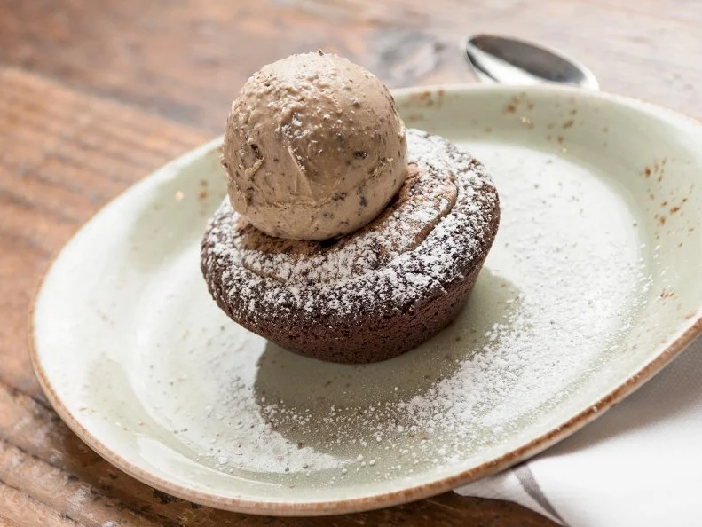 With its chic farmhouse decor, relaxed vibes and focus on local ingredients, farm-to-table restaurant Honey Salt in Las Vegas shines like an oasis in the Nevada desert. The special kidsâ   menu, Coleâ  s Corner, is named after and inspired by owners Elizabeth Blau and Kim Canteenwallaâ  s son, highlighting â  Cole Tested, Mom Approvedâ   entrees like cornflake-crusted chicken tenders and sides like grilled asparagus, tater tots or broccoli and cheese. Perennially popular dishes include the shareable flatbreads (try the prosciutto with Bellwether farms ricotta, Mission figs and grilled pears) and the Grain Power, a salad of red and white quinoa and beluga lentils topped with avocado, shaved fennel and radish dressed in a citrus vinaigrette. For dessert thereâ  s the kidsâ   menu â  sushi,â   a sweet twist on maki rolls made with puffed rice cereal and gummies, or the Brookie, a chocolate chip cookie and fudge brownie hybrid served with salted caramel chunk ice cream. Keep an eye out for their monthly Farm Table series, which highlights chef collaborations, seasonal celebrations like Chinese New Year or specific ingredients, like Nevadaâ  s Borda Family Lamb.