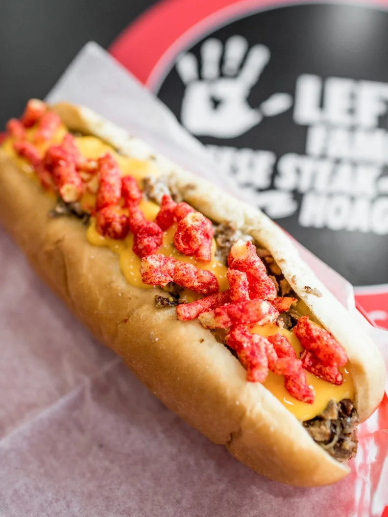 This twist on Philadelphia’s signature hoagie may not garner support from traditionalists, but should be a hit with the population of eaters who add potato chips to their sandwiches. Created by owner Sam Berry — the restaurant’s namesake lefty — the sandwich boasts all the typical cheesesteak fillings (thin-sliced beef, grilled onions, a mix of white American and Swiss cheeses) with a handful of the curly neon puffs strewn on top for added texture.