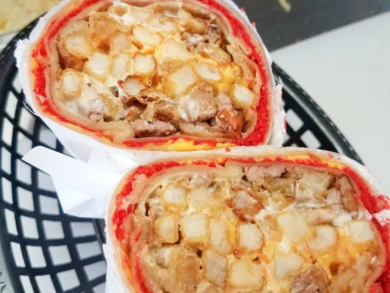 Burritos usually get a kick from hot sauce. But at San Diego street-food spot Tu Taco Taco, thereâ  s an unexpected ingredient spicing things up: Flaminâ   Hot Cheetos. Owner Victor Osuna adds pulverized bits of the corn puffs onto a cheese-covered tortilla and wraps it around a regular burrito stuffed with carne asada, cheddar and, in true California style, French fries, to make a handheld meal thatâ  s not for the mild of palate.