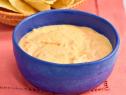 Sunny Anderson makes a Quick Queso dip, as seen on The Kitchen, Season 17.