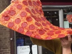 For proof that New Yorkers truly love pizza, look no further than the Pizza Barn, where slices measure 24 inches from tip to crust. The brainchild of owner Angelo Deluca, this two-footer was created for sharing, but more than one ‘za-loving customer has been known to consume the slice solo. Sure, you can enjoy the blistered slices plain, but when in Rome — er, Yonkers — why not go all out and add mac and cheese or French fries? 