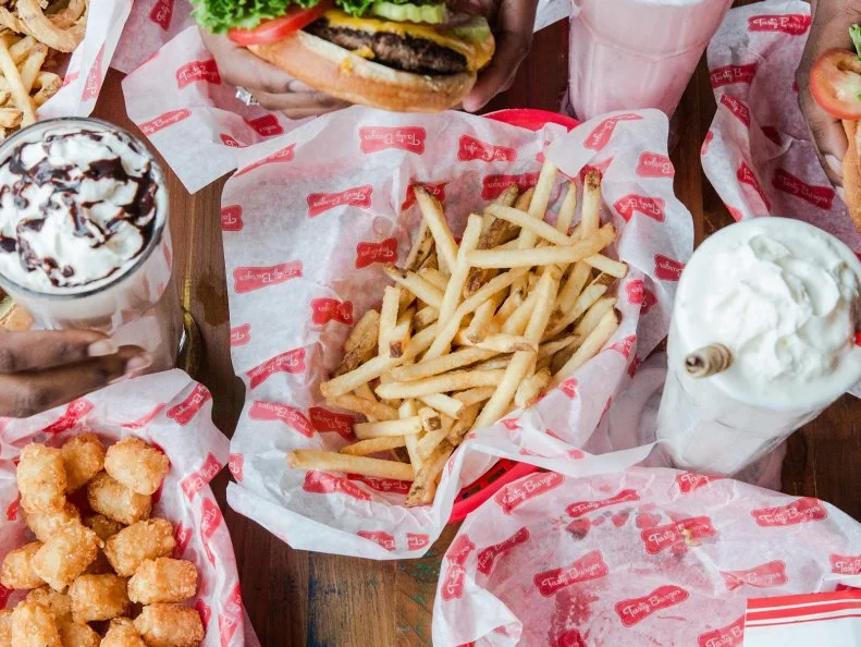 Tasty Burger in Fenway hit it out of the park with its first location in 2010. And with the success of the five locales that have followed (four around town and one in D.C.), this chain’s winning streak continues. An unbeatable combination of excellent and affordable burgers (starting at under $5), hot dogs, onion rings and 16-ounce shakes keeps the crowds coming. Make no mistake, though, Tasty Burger is no greasy fast-food joint. To wit, grass-fed beef is used for the burgers and all the sauces are made from scratch. If you’re an over-21 college student, you’re in luck: The Starvin’ Student special, with a burger, fries and a beer, is just $10.