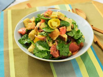 Sunny Anderson makes a Spicy Spinach Panzanella, as seen on The Kitchen, Season 17.