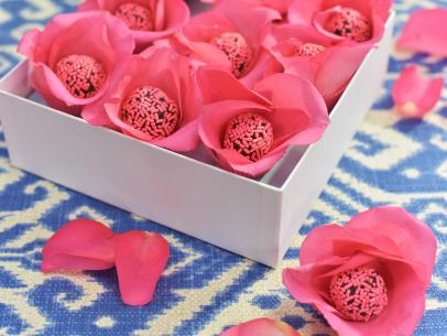 Katie Lee makes a Rose Petal Craft with Geoffrey Zakarian's Rosewater Chocolate Truffles, as seen on The Kitchen, Season 17.