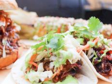 <p>Head to this food truck for Mexican favorites like tacos and burritos with a smoky barbecue twist. Come for the meaty entrees, but don&rsquo;t leave without the Cajeta-Stuffed Churros. A vanilla-laced batter is fried in sweet duck fat until it transforms into fluffy churro balls. The fried treats are then rolled in cinnamon sugar, stuffed with cajeta (a caramel sauce made from goat&rsquo;s milk) and drizzled with caramel and chocolate ganache. Fiery jalapeno bacon crumbles complete the creation.</p>