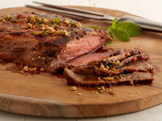 Broiled Paprika Flank Steak with Toasted Spiced Nuts image