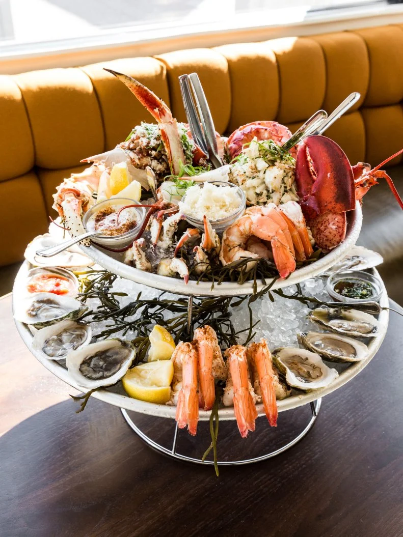 This buzzy neighborhood restaurant and oyster bar by Ford Fry, situated across from his alma mater in the Lamar-River Oaks Shopping Center, boasts a diverse menu with bold Southern influences. Forego a seat in the dining room and opt for the brightly lit oyster bar, where you can smell the saltiness in the air. Indulge in a seafood tower, complete with smoked redfish and oysters on the half shell. If you’re still hungry, add on a cheese enchilada “a la Felix” for a classic Houston moment.