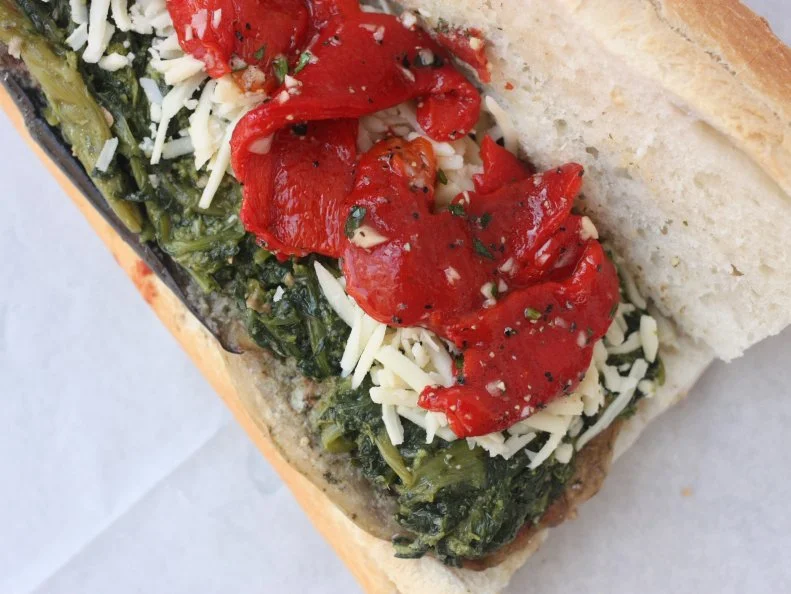 Though Philly-style hoagies — you might call them heros or subs — are typically the domain of meat lovers, one version offered at Antonio’s Deli ditches the cold cuts entirely. Built on seeded bread from nearby bakery Sarcone’s, the veggie hoagie stacks up rounds of Roman-style baked eggplant, garlicky broccoli rabe and marinated red peppers, all sprinkled with a shredded sharp provolone blend. With plenty of heft and a price of just $8, it’s the vegetarian heavyweight of Antonio’s hoagie selection.