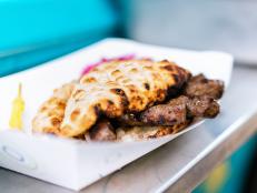 In a meat-loving city like St. Louis, carnivores have plenty of dining options. But Balkan Treat Box stands out for its sausage-stuffed sandwich priced at a steal. The cevapi sandwich ($10) is a top seller at this food truck known for its Bosnian and Turkish eats. To make it, they grill more than half a pound of mini beef sausages over charcoal, then stuff the mound of meat into a freshly baked somun pita with onions and a Bosnian cream cheese called kajmak. Take it from us, you may need a post-meal nap after tackling this bargain behemoth.