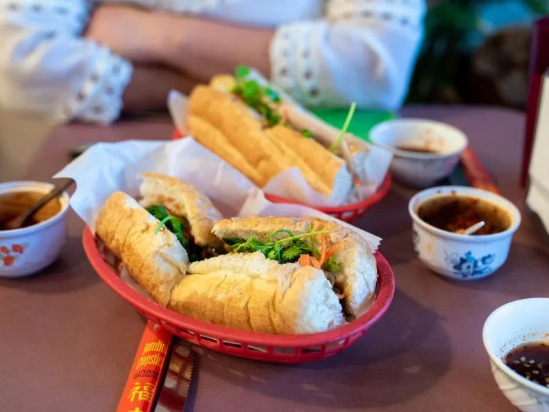 Score a satisfying sandwich without shelling out major bank at this spot that offers seven banh mi options, most of which are priced at $3.95. They build each one on the traditional baguette that typifies this Vietnamese sandwich, cramming the sliced loaf with fresh and pickled carrots and daikon, sprigs of cilantro and jalapenos for a tinge of heat, then customizing it with your choice of protein. The selection includes vegetarian, vegan, chicken and pork options. Feel like splurging? They’ll pile on extra for $1.50 more.