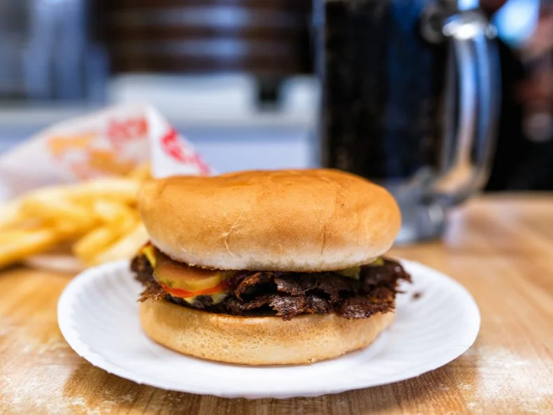 Carl’s Drive In has been the king of cheap eats in St. Louis since the 1950s, thanks to its old-school prices that continue to stay super-low. A cheeseburger, fries and a mug of housemade root beer will set you back just $6.00. The patties are smashed thin, though, so you may want to shell out a few extra bucks for this extra-satisfying upgrade: a triple cheeseburger, onion rings and an even bigger root beer mug that all adds up to $10.50 total.