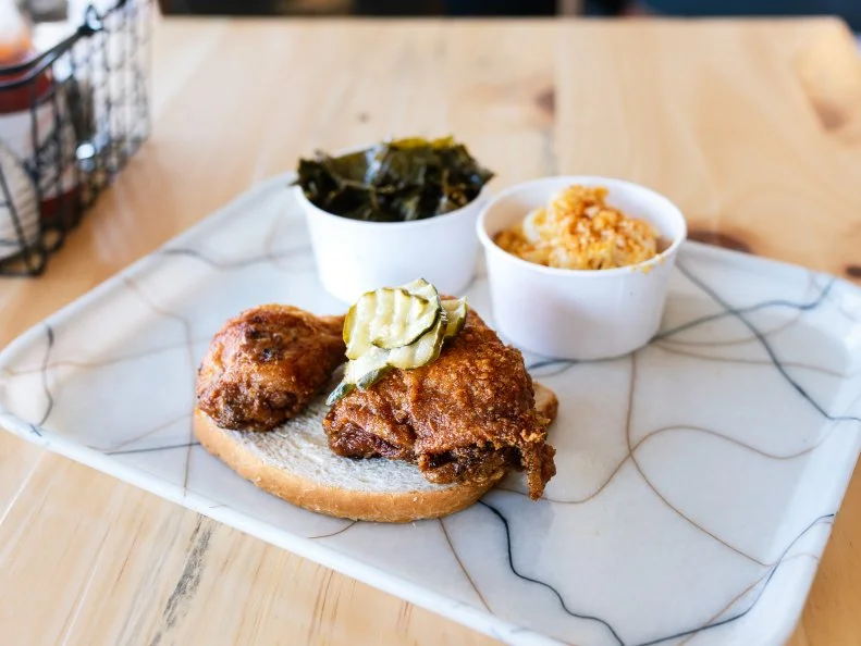 Billing your fried chicken as famous may seem like a bit much, but Chef Rick Lewis turns out a bird worthy of the hype. Take one bite of Rick’s Famous Fried Chicken and you’ll see why it’s earned a cult-like following in St. Louis. The chef builds layers of spicy flavor by using both a brine and a rub before dredging and frying the bird. Think you can handle extra heat? Get the Nashville-style option dipped in a fiery oil. The quarter chicken costs $10, and that includes two of Grace Meat & Three’s massive (and massively delicious) seasonal sides. 