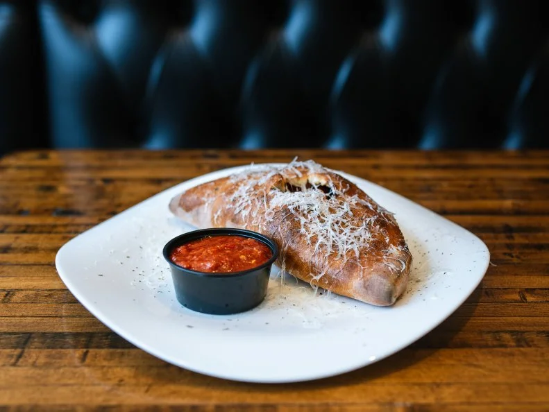 Things St. Louisans love: meat, pizza, bread. That’s why the Meat Me in St. Louie calzone ($9) at Sauce on the Side is beloved citywide. This oversized calzone comes crammed with pepperoni, Italian sausage, provel (because you’re in St. Louis, after all) and a blend of mascarpone and ricotta cheeses. As if that combo isn’t rich enough on its own, a side of meat sauce accompanies every order. This beast is big enough to share, but we won’t judge if you decide to save the second half to eat tomorrow.
