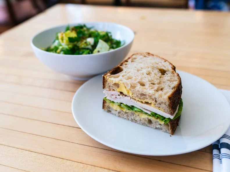 No need to drop a lot of dough for lunch at Union Loafers. The $12 lunch special gets you a soup (Kale & Garbanzo) or a salad (Little Gem) paired with one of two half sandwich options. It might sound basic, but it’s a deal you don’t want to miss. The sandwiches alone may convert you, as they’re all built on the bakery’s much-buzzed-about bread. 
