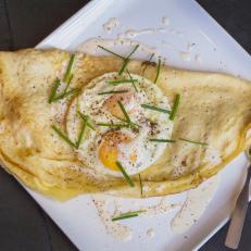 This giant classic crepe from Virue is made with parma cotto ham | gruyere | eggs | mornay | chives