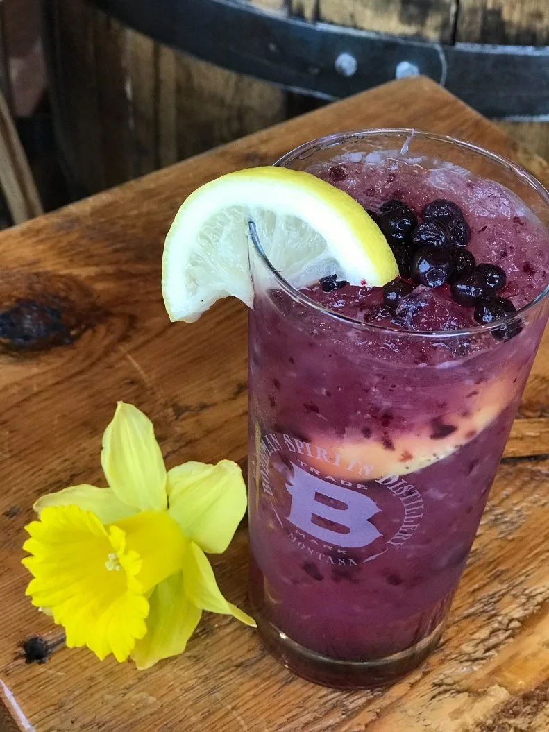 Inspired by the endless fields of grains and the huckleberries that grow wild in the Montana mountains, this punch is named for the gold-seekers (who were more likely to find berries than nuggets). Huckleberries and lemons are muddled, then shaken with the Distillery’s 1889 Whiskey, honey simple syrup, lemonade and lavender bitters.