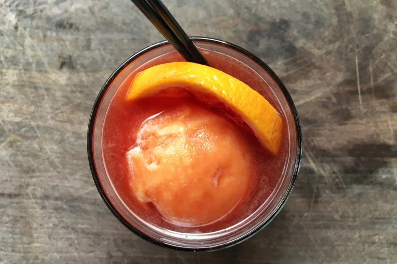 This collaboration between bar manager Aaron Zieske and pastry chef Erin Hughes (on both the cocktail and dessert menus) is a play on the Tequila Sunrise. Blanco tequila and pomegranate grenadine are mixed together, poured into a rocks glass and topped with an ample scoop of brightly hued blood orange sorbet. Is it dessert, or a nightcap? Yes.
