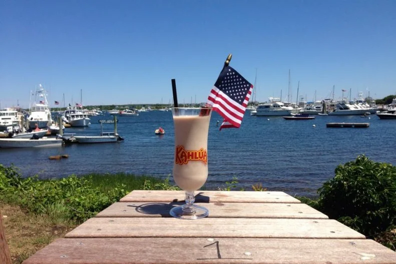 Named for the island separated from the Rhode Island mainland by a sound of the same name, this â  unofficialâ   drink of Block Island is best sipped on the patio overlooking the water after a long day at the beach. Baileyâ  s, Kahlua and vodka are blended with just enough ice to make it thick and smooth but still drinkable through a straw.