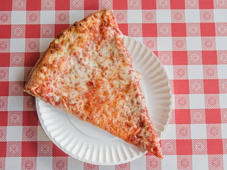 Like kitties to catnip, customers are drawn to the hand-tossed pizzas served at Alley Cat. This Manchester mainstay has consistently ranked as a top pick in local and national publications for its feline-inspired pies. Individual slices come in just two options — plain cheese and pepperoni — but the impeccable thin-crust alone makes them just as worthy of attention as the specialty pies. If you’re game to commit to an entire pie, the most-popular picks include the Aztec Cat with buffalo chicken and blue cheese; the Fat Cat with barbecue chicken and red onion; and the Stray Cat with eggplant and ricotta. 