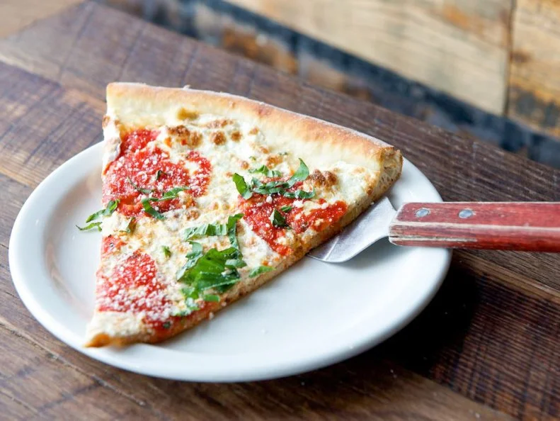 David and Tara Tierman quit their day jobs in 2011 to follow their bliss: pizza. Now recovering attorneys, the couple teamed up with their lifelong friend (and experienced restaurateur) Tanner Jacobs to bring New York-style pies to East Nashville’s hip Five Points neighborhood. The trio traverse familiar terrain with straightforward classics like the ever-popular pepperoni slice, but also veer into gourmet territory with the likes of hot capicola and spicy habanero cream sauce. No matter your pick, the pies are big, slices are huge and the ingredients are always fresh. The place has been such a hit, the team is opening second location to keep up with demand.